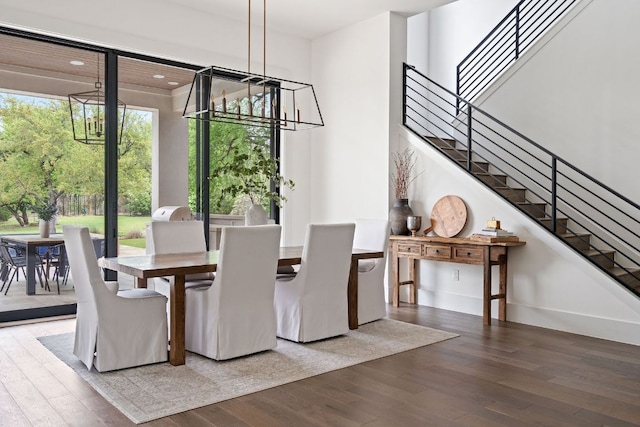 13213 Meridian Park Blvd, Austin, TX 78739 - dining room featuring a chandelier, wood-type flooring, stairway, and recessed lighting