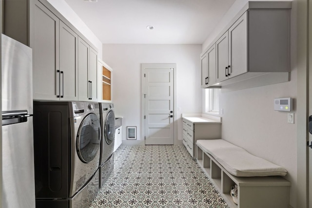 13213 Meridian Park Blvd, Austin, TX 78739 - laundry room with independent washer and dryer and cabinet space