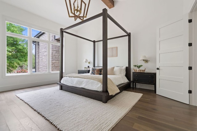 13213 Meridian Park Blvd, Austin, TX 78739 - bedroom featuring wood finished floors, multiple windows, and baseboards