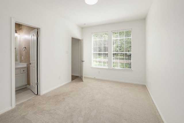 12207 Carlsbad Dr, Austin, TX 78738 - unfurnished bedroom with light carpet and ensuite bathroom