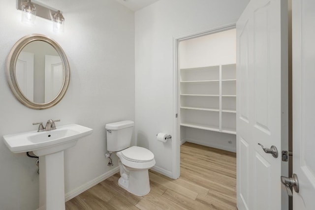 12207 Carlsbad Dr, Austin, TX 78738 - bathroom with wood finished floors and toilet