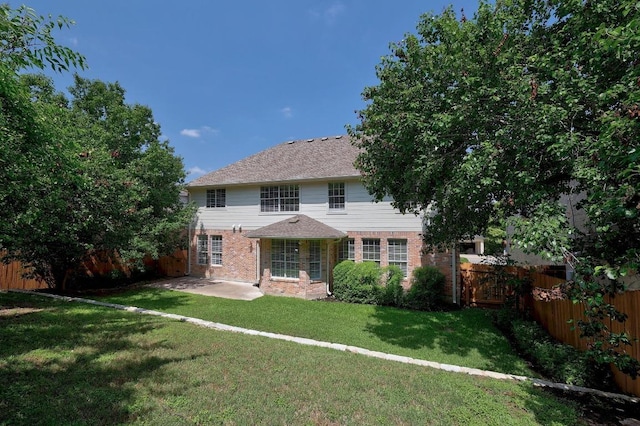 12207 Carlsbad Dr, Austin, TX 78738 - rear view of property with brick siding, a fenced backyard, and a patio area