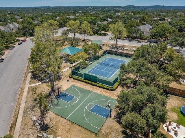 view of basketball court featuring community basketball court and fence