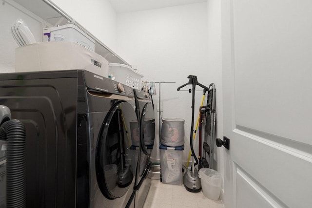 1220 Calendula Trl, Georgetown, TX 78628 - laundry area with washing machine and clothes dryer