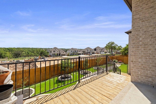 1220 Calendula Trl, Georgetown, TX 78628 - wooden deck with a residential view and a fenced backyard