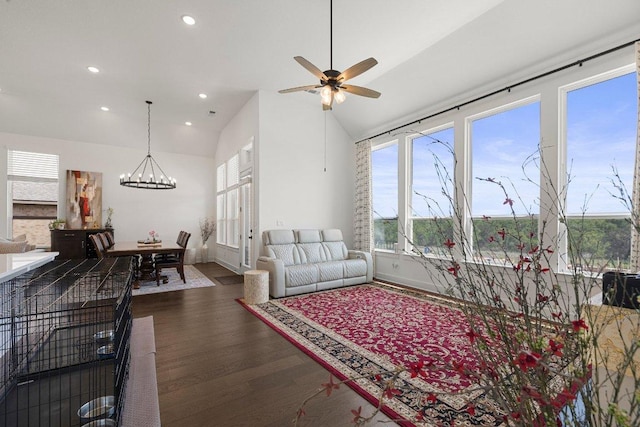 1220 Calendula Trl, Georgetown, TX 78628 - living room featuring plenty of natural light, a chandelier, wood finished floors, a ceiling fan, and recessed lighting