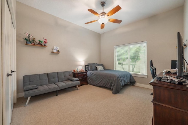 10305 Pickfair Dr, Austin, TX 78750 - carpeted bedroom with baseboards and a ceiling fan