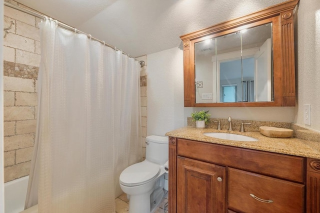 10305 Pickfair Dr, Austin, TX 78750 - full bathroom with vanity, toilet, and shower / tub combo
