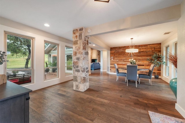 10305 Pickfair Dr, Austin, TX 78750 - dining area with dark wood-style flooring, ornate columns, and recessed lighting