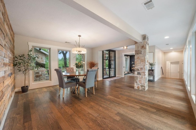 10305 Pickfair Dr, Austin, TX 78750 - dining room featuring wood finished floors, baseboards, and beamed ceiling