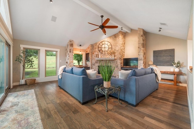 10305 Pickfair Dr, Austin, TX 78750 - living area with ceiling fan, wood finished floors, beamed ceiling, high vaulted ceiling, and a large fireplace