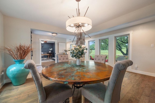 10305 Pickfair Dr, Austin, TX 78750 - dining area featuring baseboards and wood finished floors