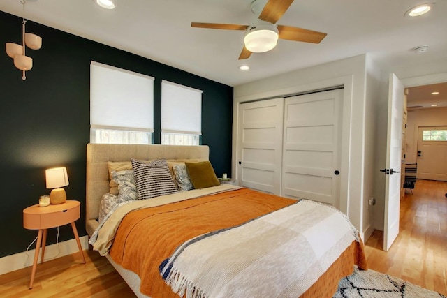 2000 E 8th St, Austin, TX 78702 - bedroom featuring light wood finished floors, a closet, recessed lighting, ceiling fan, and baseboards