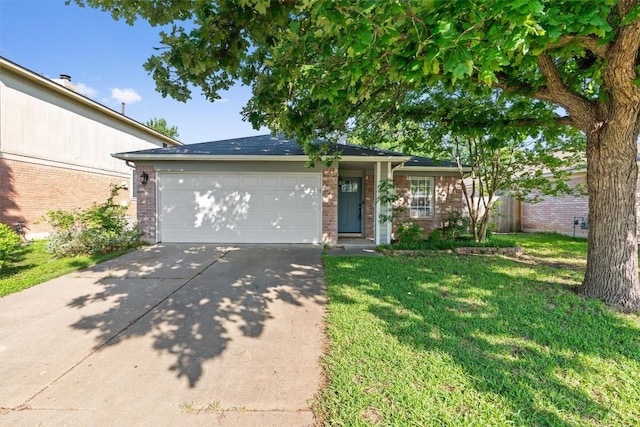 view of front facade featuring brick siding, driveway, a front yard, and an attached garage