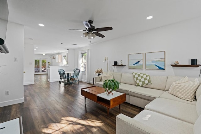 living room featuring recessed lighting, wood finished floors, baseboards, and ceiling fan