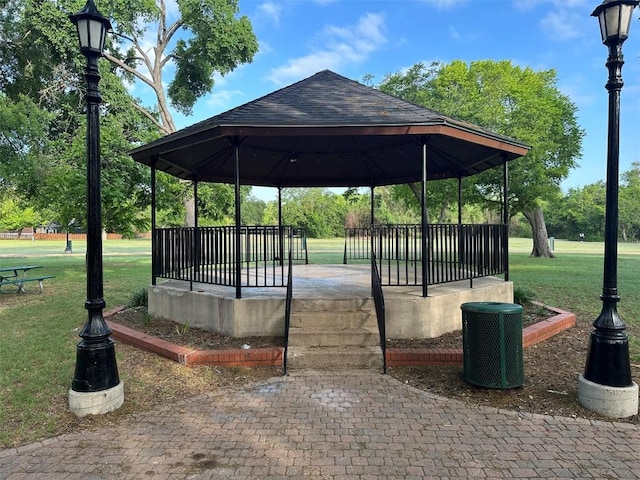 view of community with a gazebo and a yard