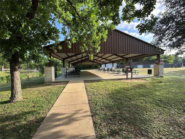 view of home's community with a gazebo and a yard
