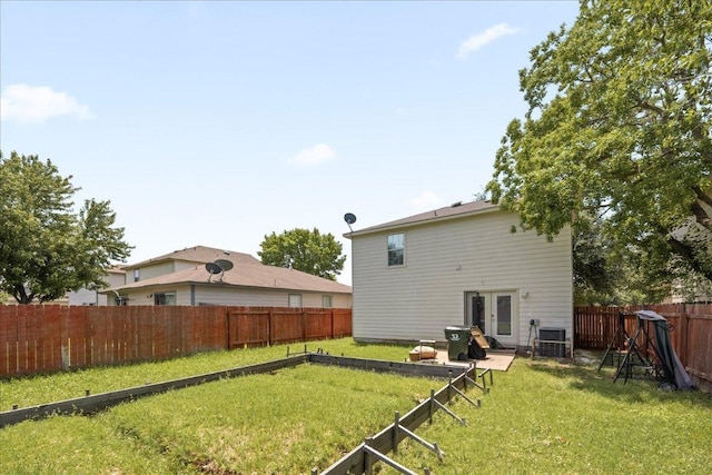 89 Jan Ln, Georgetown, TX 78626 - back of house with french doors and cooling unit