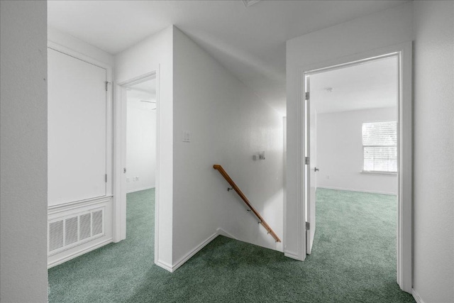 89 Jan Ln, Georgetown, TX 78626 - hall featuring an upstairs landing, carpet floors, and baseboards