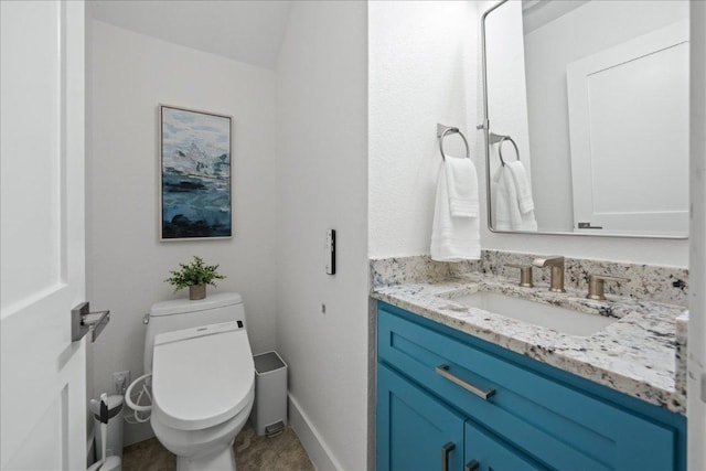 89 Jan Ln, Georgetown, TX 78626 - half bathroom with toilet, vanity, and baseboards