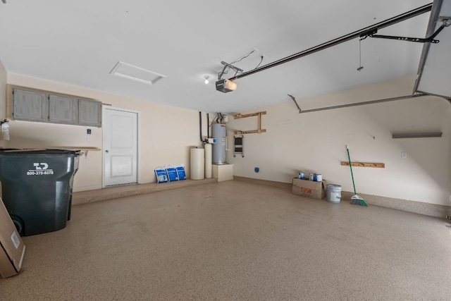 113 Evening Dusk Dr, Kyle, TX 78640 - garage featuring a garage door opener and electric water heater