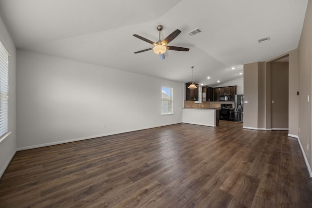 113 Evening Dusk Dr, Kyle, TX 78640 - unfurnished living room featuring lofted ceiling, a ceiling fan, dark wood-style floors, and recessed lighting