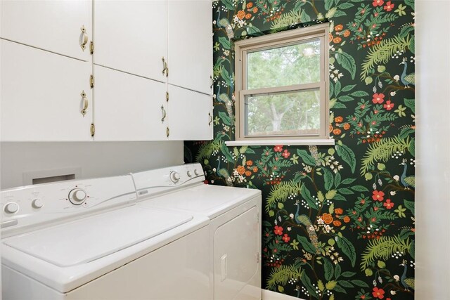 1805 Northridge Dr, Austin, TX 78723 - clothes washing area featuring cabinet space, wallpapered walls, and washing machine and dryer