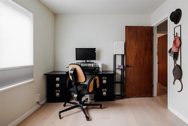 1805 Northridge Dr, Austin, TX 78723 - office area featuring wood finished floors, plenty of natural light, and baseboards