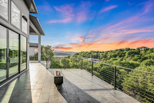 235 Canyon Turn Trl, Austin, TX 78734 - view of patio / terrace with a fire pit and a balcony