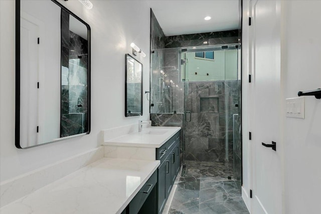 235 Canyon Turn Trl, Austin, TX 78734 - bathroom with vanity, marble tiled floors, a marble finish shower, and recessed lighting