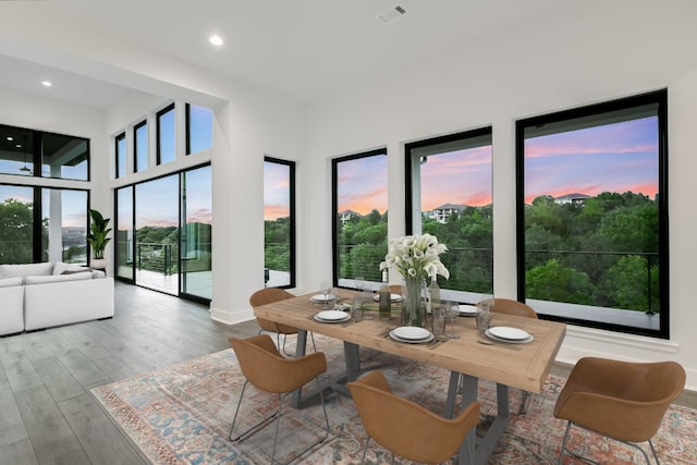 235 Canyon Turn Trl, Austin, TX 78734 - dining space with wood finished floors, baseboards, and recessed lighting