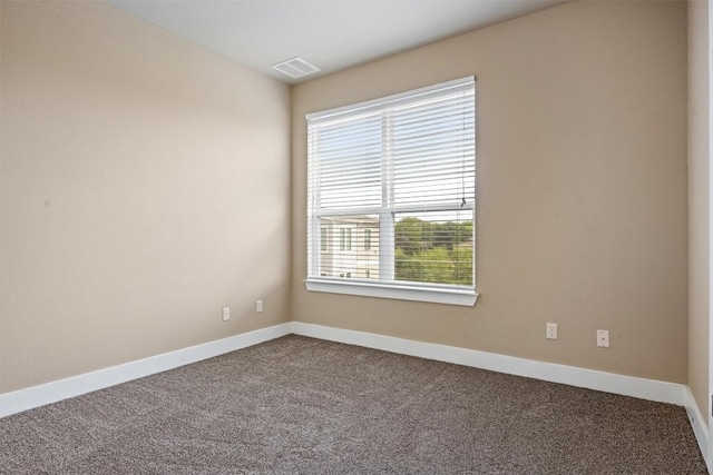 2621 Witsome Loop, Austin, TX 78741 - unfurnished room featuring carpet floors and baseboards