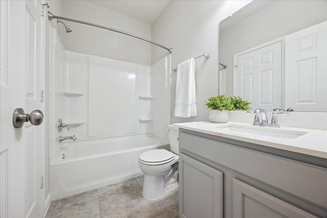 full bathroom featuring vanity, toilet, and  shower combination