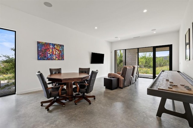 4202 Serene Hills Dr, Austin, TX 78738 - dining room with concrete floors, recessed lighting, and baseboards
