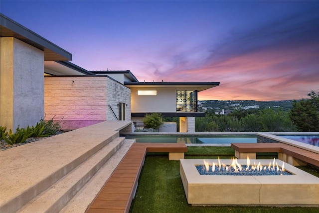 4202 Serene Hills Dr, Austin, TX 78738 - swimming pool featuring an outdoor fire pit