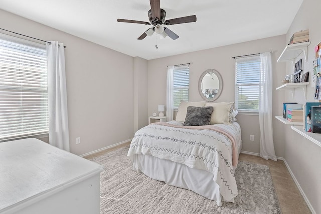 476 Sheepshank Dr, Georgetown, TX 78633 - carpeted bedroom with baseboards and a ceiling fan