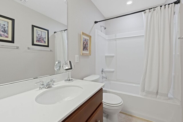 bathroom with toilet, vanity, shower / bath combo, and recessed lighting
