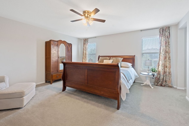 476 Sheepshank Dr, Georgetown, TX 78633 - bedroom with multiple windows, light colored carpet, and ceiling fan