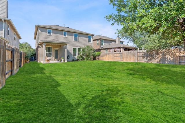 476 Sheepshank Dr, Georgetown, TX 78633 - back of house featuring a fenced backyard and a patio area
