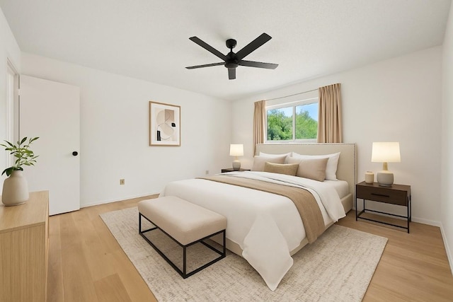 1046 Verbena Dr Unit 1474, Austin, TX 78750 - bedroom with light wood-style flooring and a ceiling fan