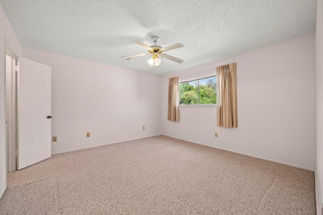 1046 Verbena Dr Unit 1474, Austin, TX 78750 - unfurnished room with a ceiling fan, carpet floors, a textured ceiling, and baseboards