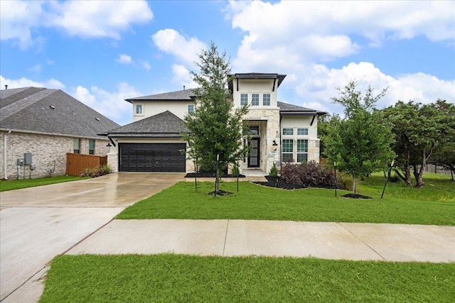 208 Carolina Jasmine Dr, San Marcos, TX 78666 - view of front of house featuring stone siding, an attached garage, concrete driveway, stucco siding, and roof with shingles