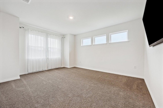 208 Carolina Jasmine Dr, San Marcos, TX 78666 - empty room featuring carpet and baseboards