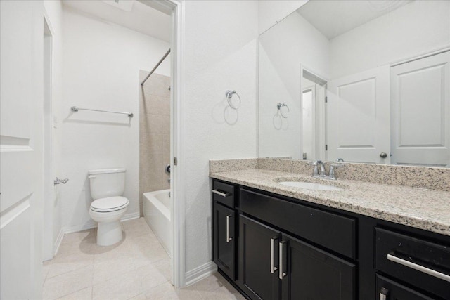 208 Carolina Jasmine Dr, San Marcos, TX 78666 - full bathroom featuring vanity, toilet,  shower combination, tile patterned flooring, and baseboards
