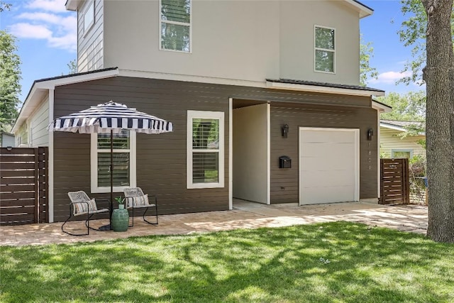 1809 Pasadena Dr, Austin, TX 78757 - back of property with a garage and a patio area