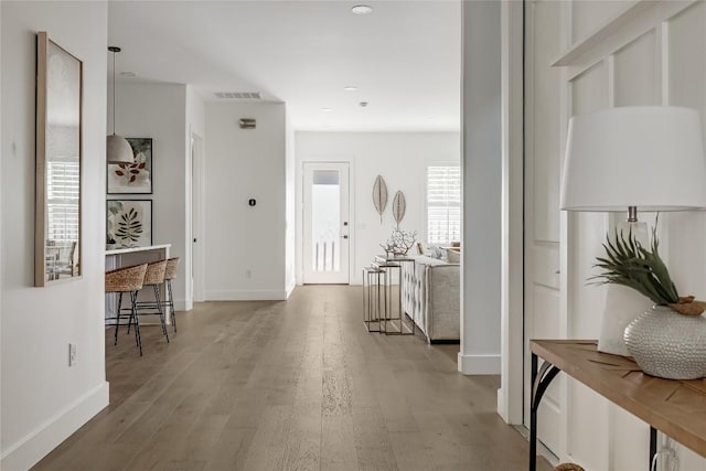 1809 Pasadena Dr, Austin, TX 78757 - hall featuring wood finished floors and baseboards