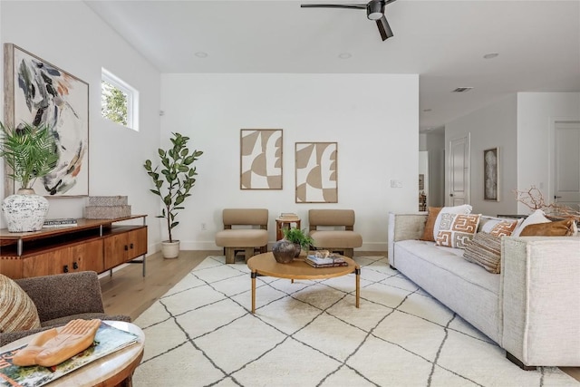 1809 Pasadena Dr, Austin, TX 78757 - living area featuring a ceiling fan and light wood-style flooring