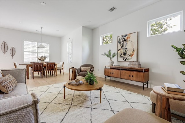 1809 Pasadena Dr, Austin, TX 78757 - living area with light wood-style flooring and baseboards