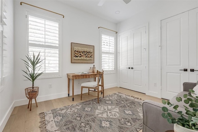 1809 Pasadena Dr, Austin, TX 78757 - office featuring healthy amount of natural light, light wood-style floors, baseboards, and ceiling fan