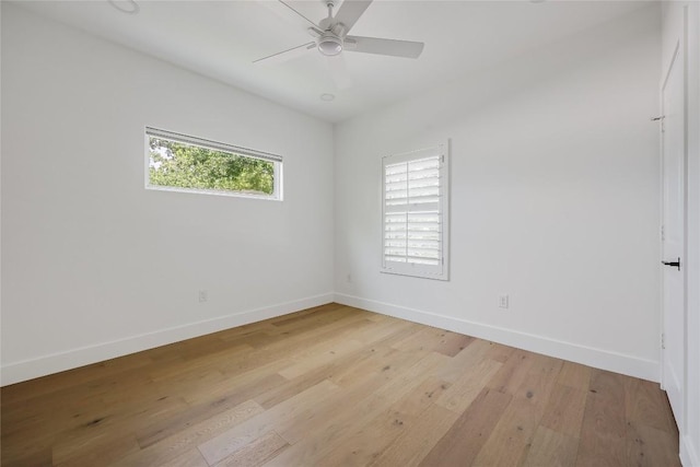 1809 Pasadena Dr, Austin, TX 78757 - unfurnished room featuring baseboards, light wood-style floors, and ceiling fan
